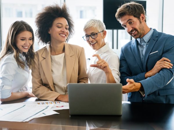 portrait-of-successful-business-team-working-in-office.jpg